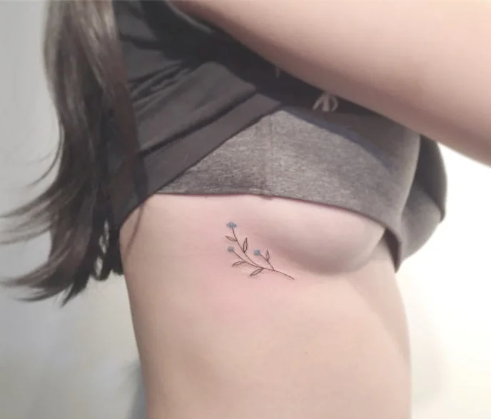 bloem borst tattoo